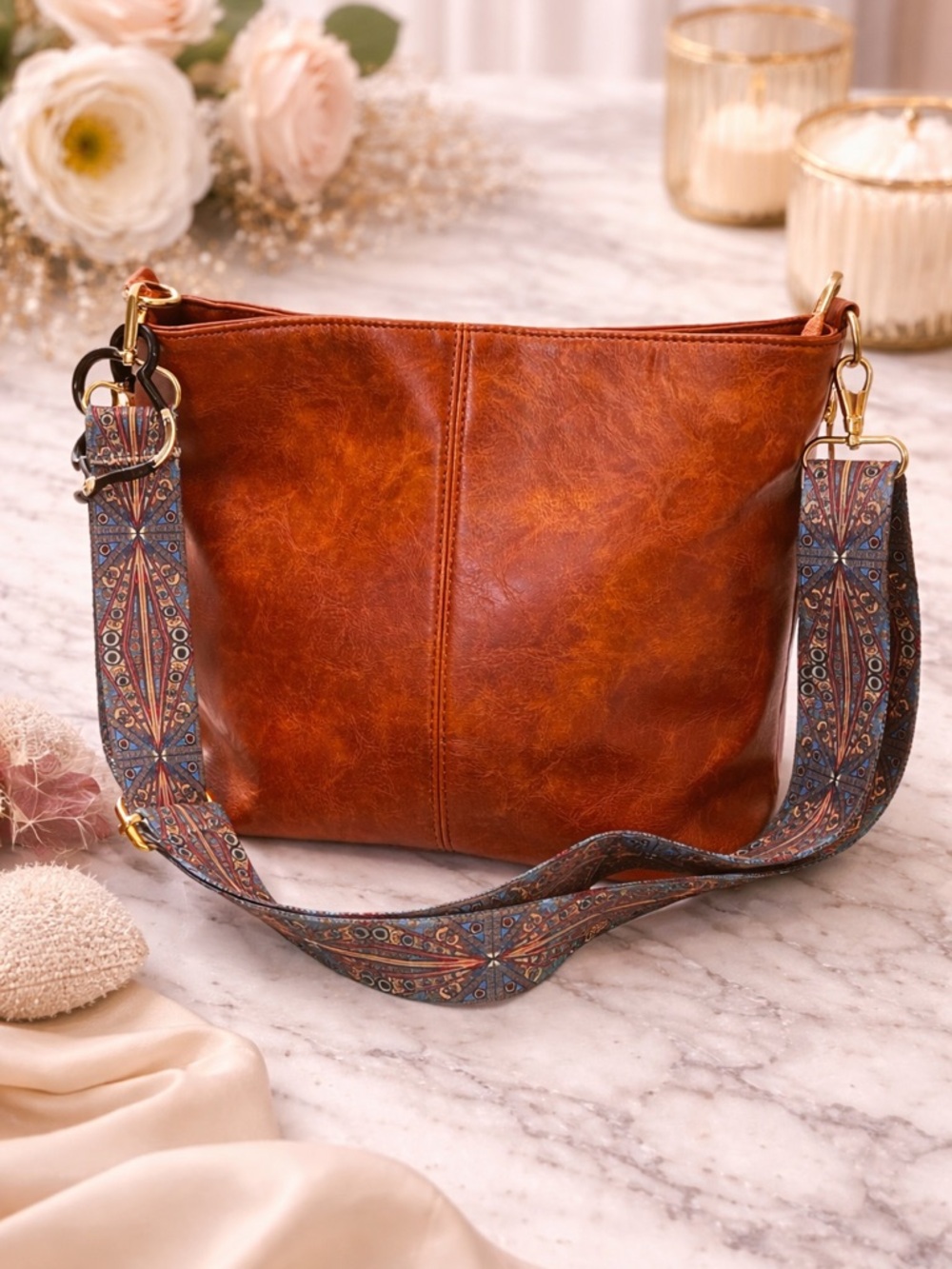 Classic Cognac Leather Crossbody Bag with Patterned Strap